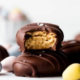 peanut butter egg candy with bite taken out to show filling
