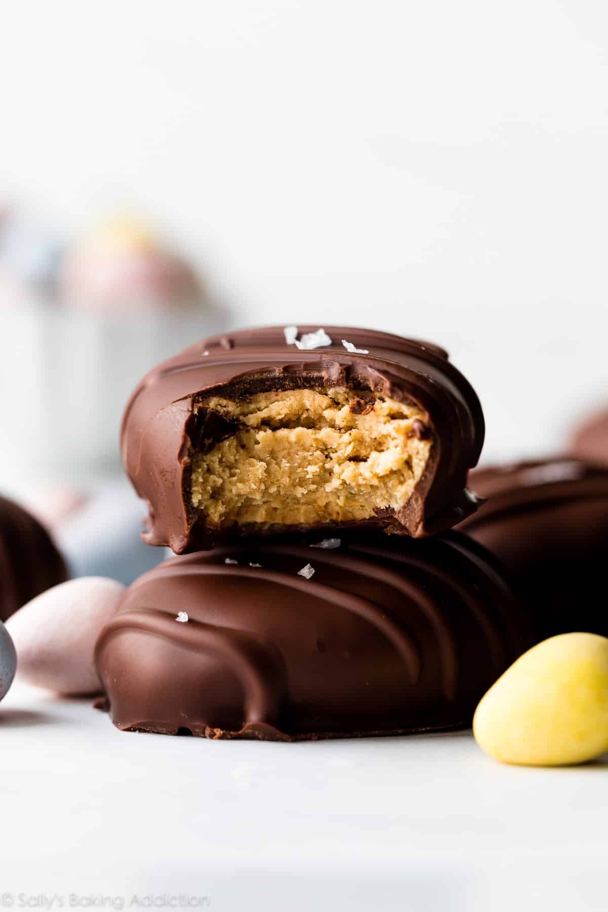 peanut butter egg candy with bite taken out to show filling