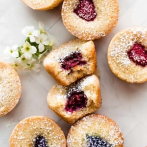 brown butter tea cakes with raspberries and blackberries in center