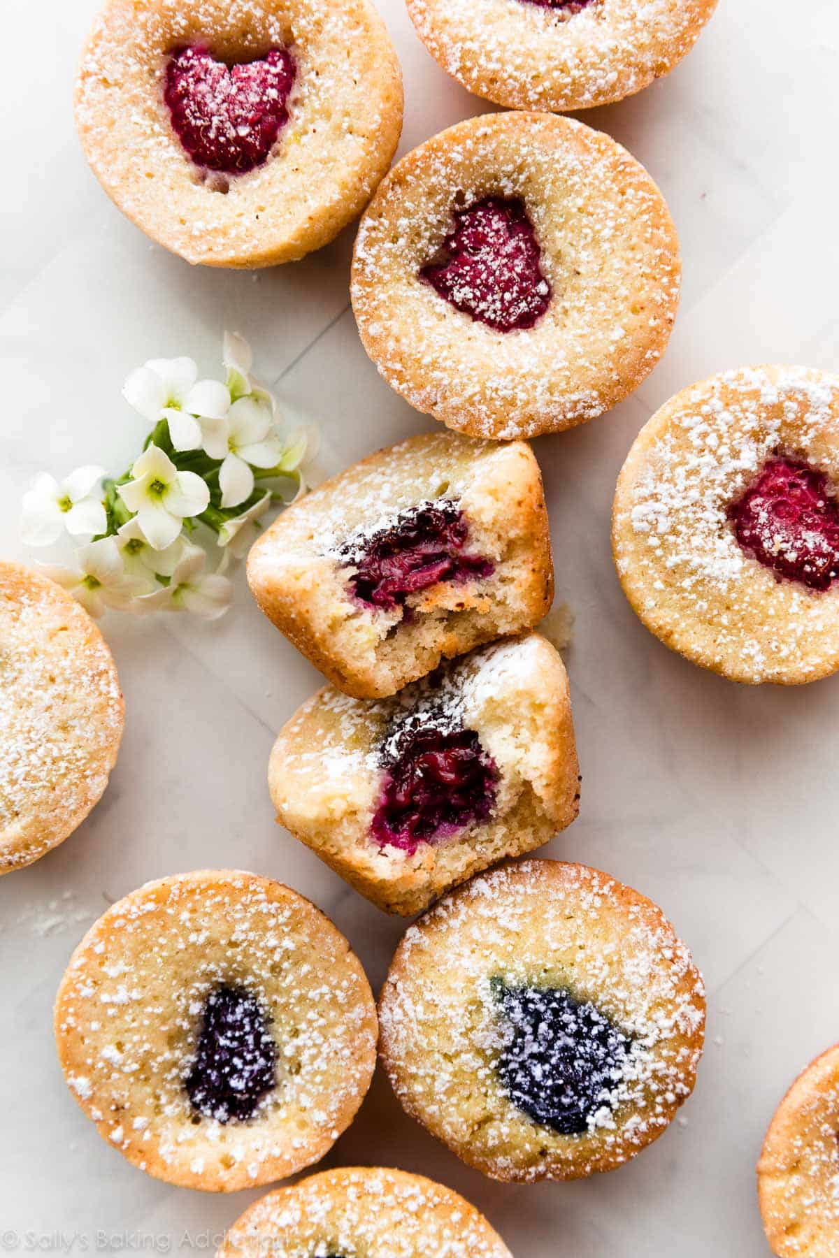 brown butter tea cakes with raspberries and blackberries in center