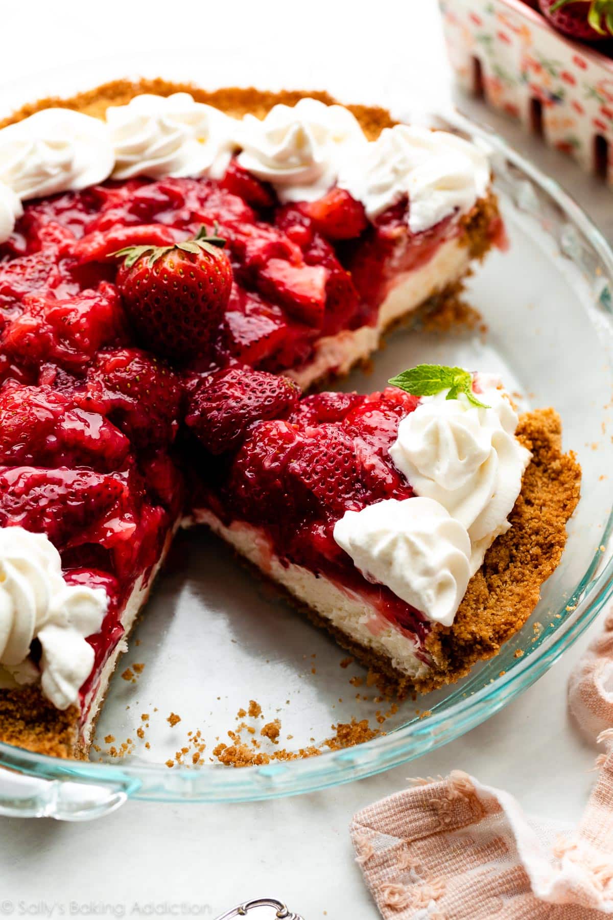 strawberry cream cheese pie in glass pie dish