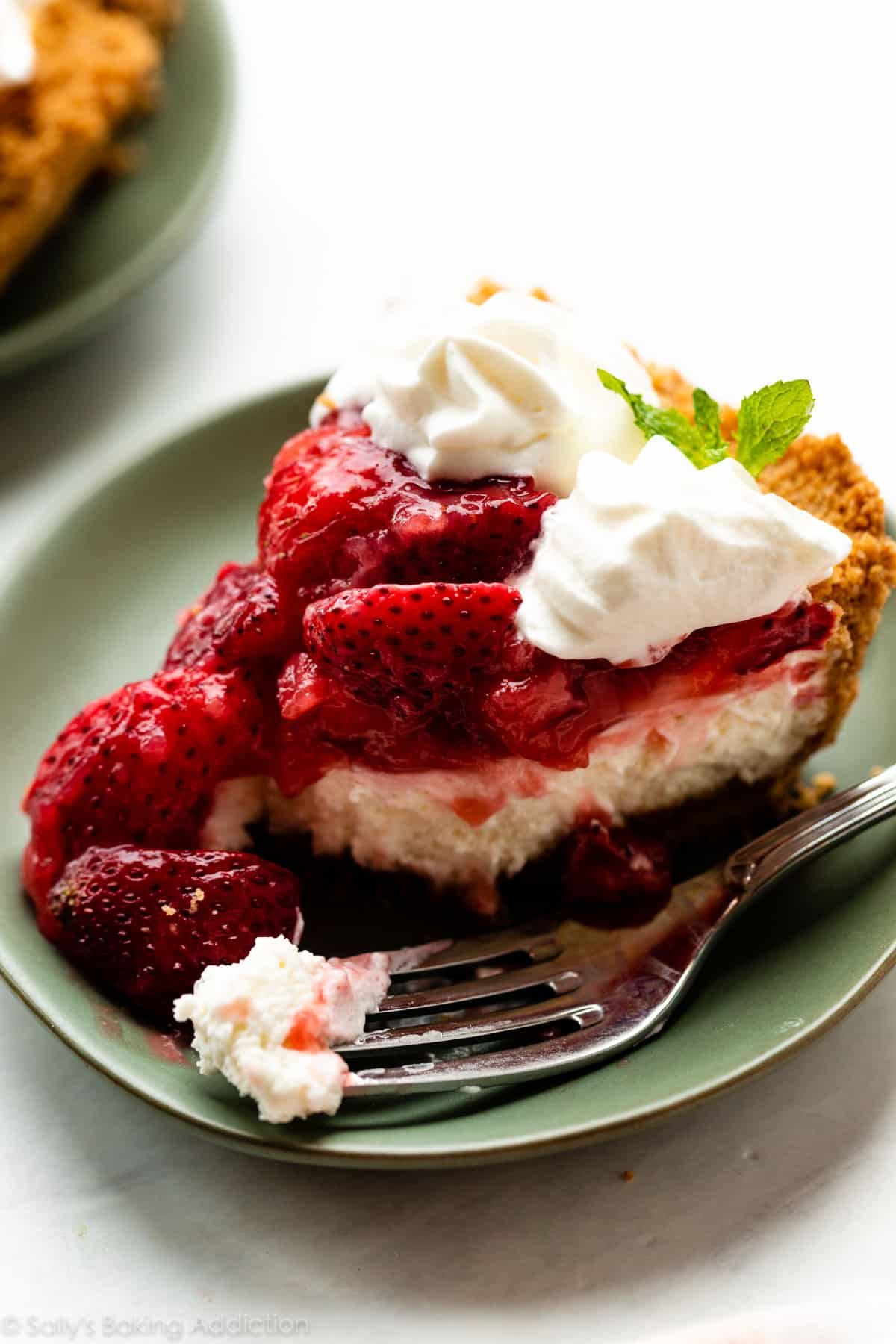 Cream cheese strawberry pie on a green plate