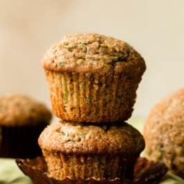 two zucchini muffins stacked