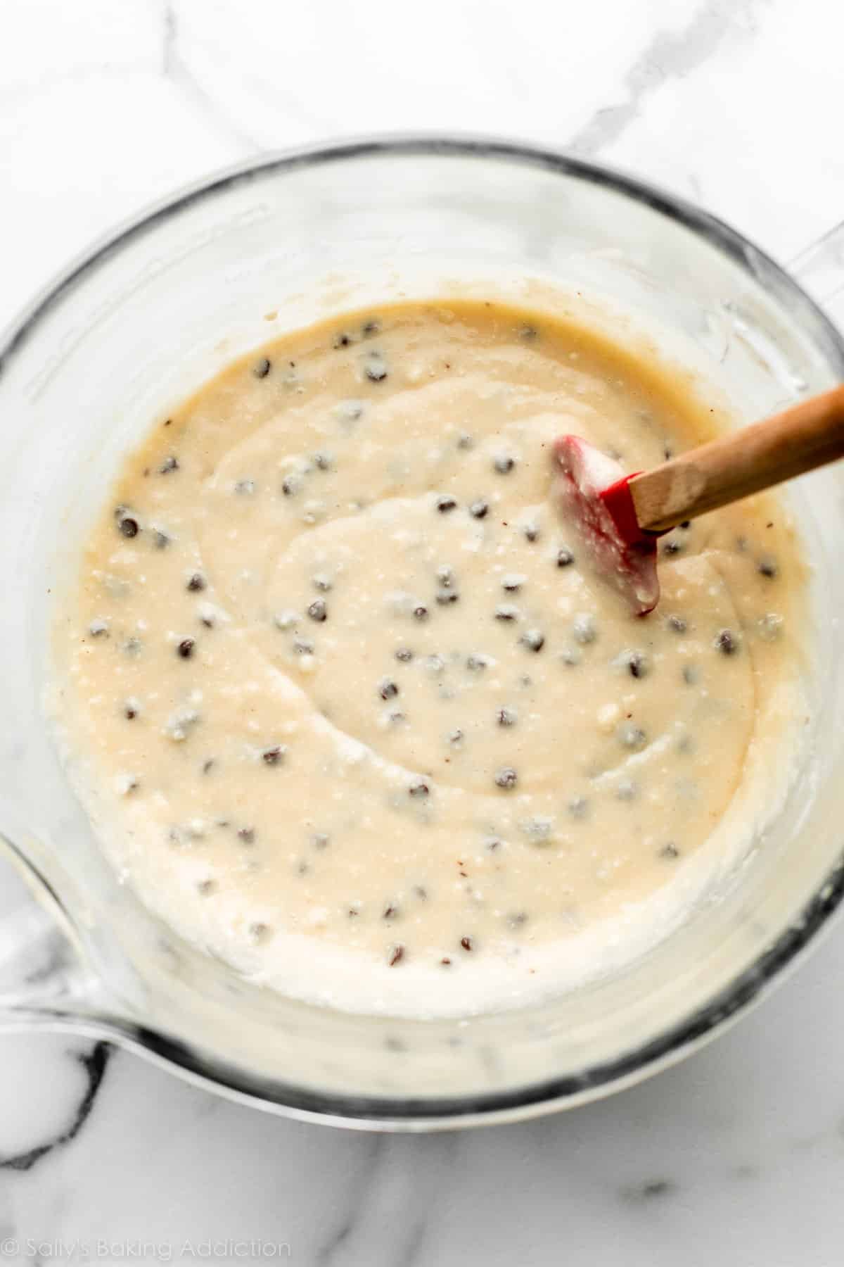 chocolate chip cake batter in glass bowl.