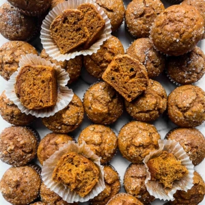 overhead photo of 30+ pumpkin muffins.