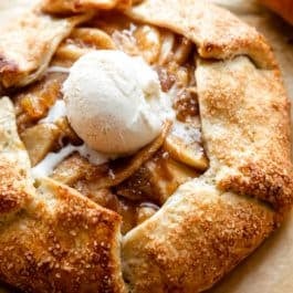 whole pear galette with vanilla ice cream on top.