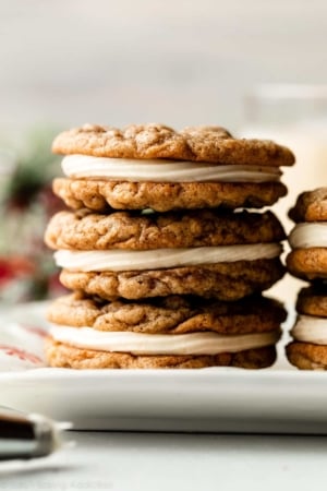 close-up photo of stack of 3 eggnog oatmeal cream pie cookies.