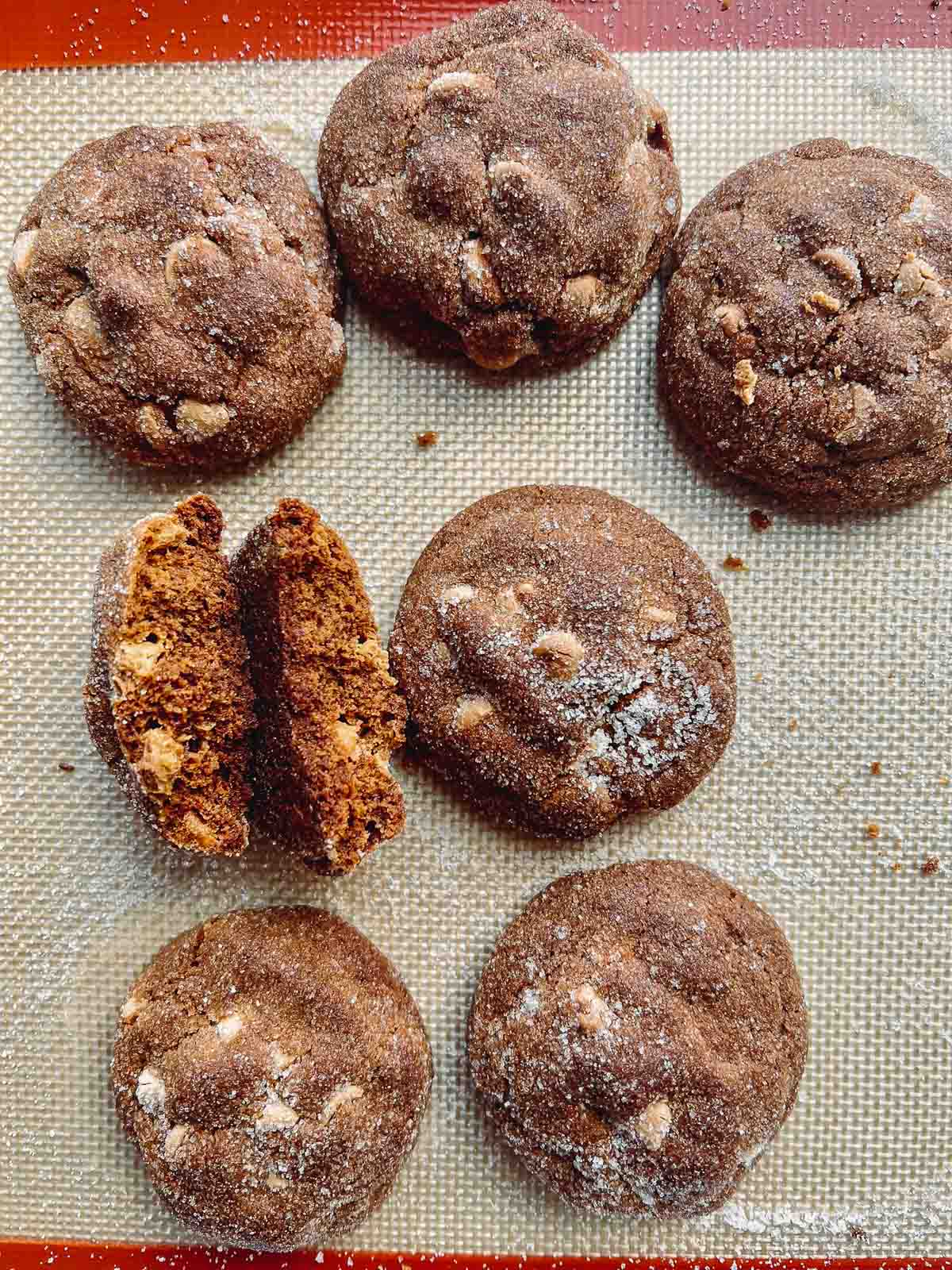 burnt molasses cookies on baking sheet.