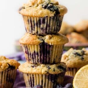 stack of 3 lemon blueberry muffins.