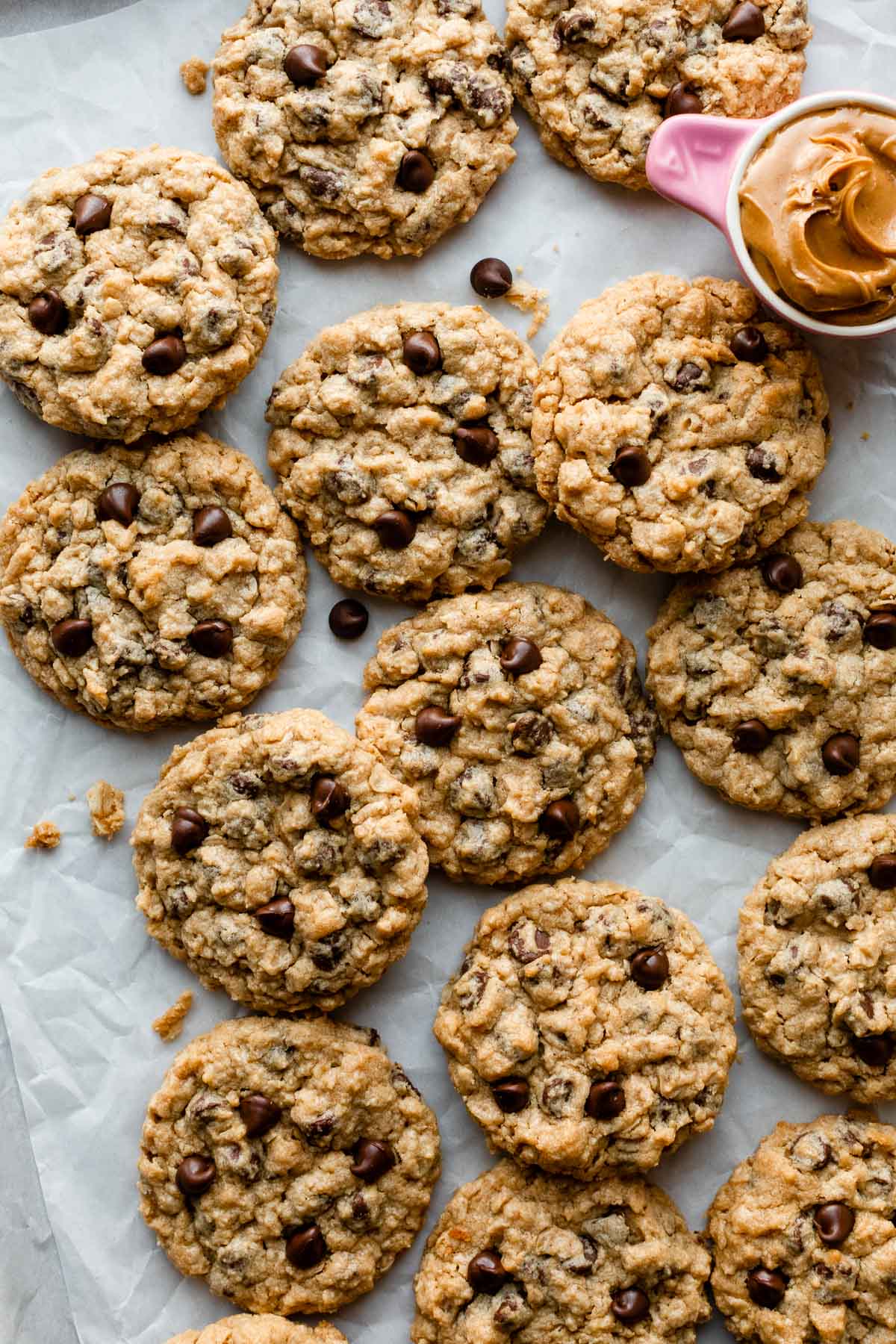 peanut butter oatmeal cookies on parchment paper.