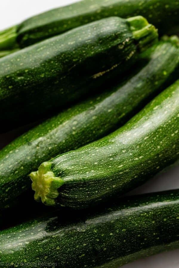 close up image of 5 zucchinis.