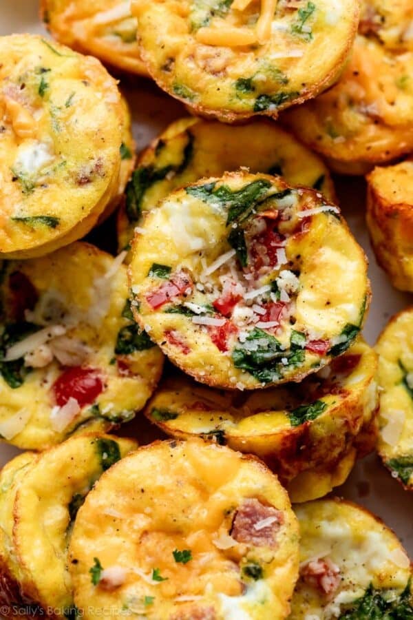 egg muffins with ham, cheddar, red pepper, spinach, and feta.