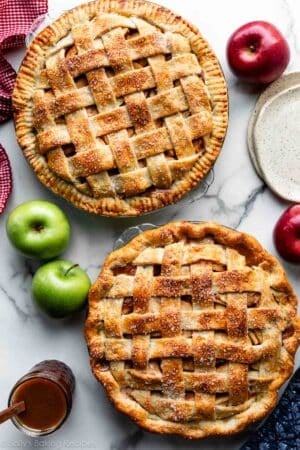 two apple pies shown with lattice pie crust tops and one with a crimped pie crust edge and another with a fluted pie crust edge.