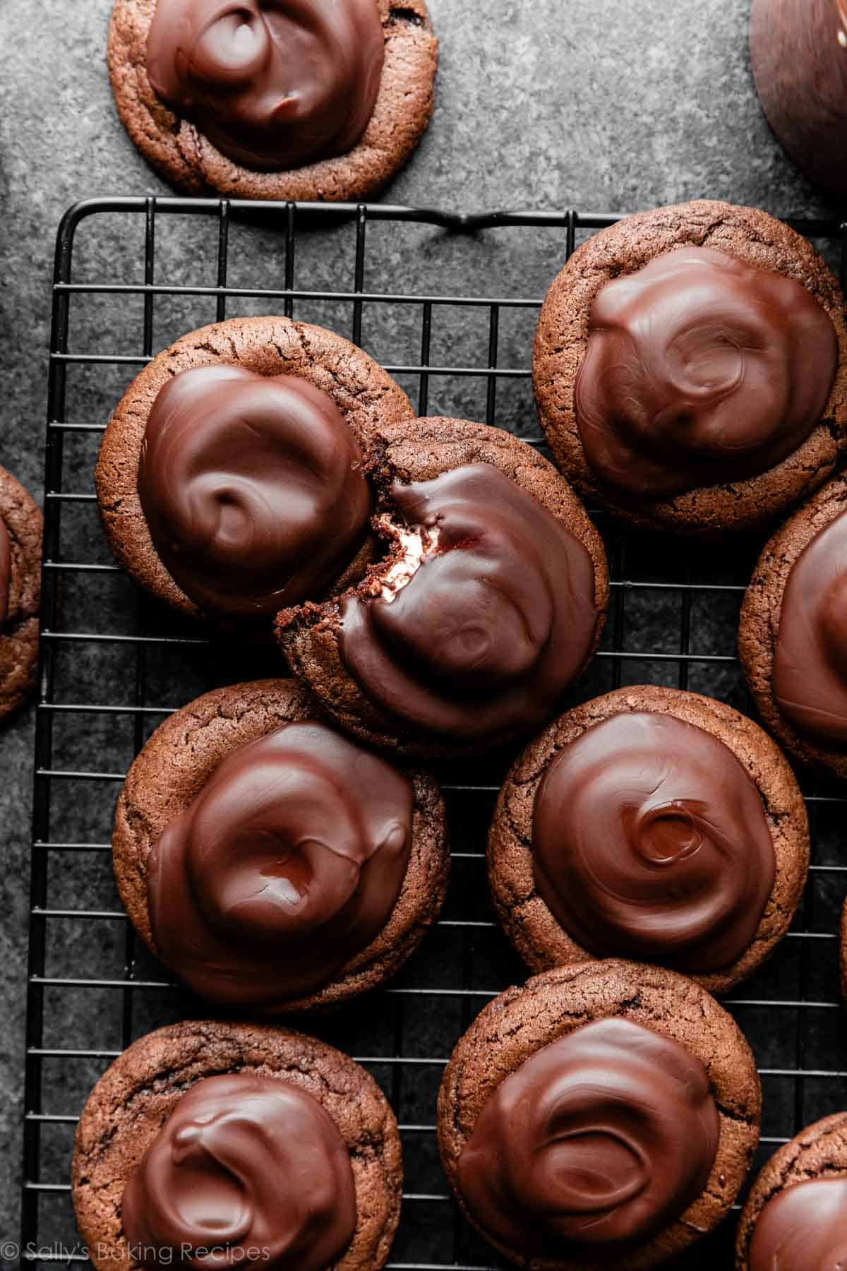 hot cocoa cookies with chocolate covered marshmallow on top.