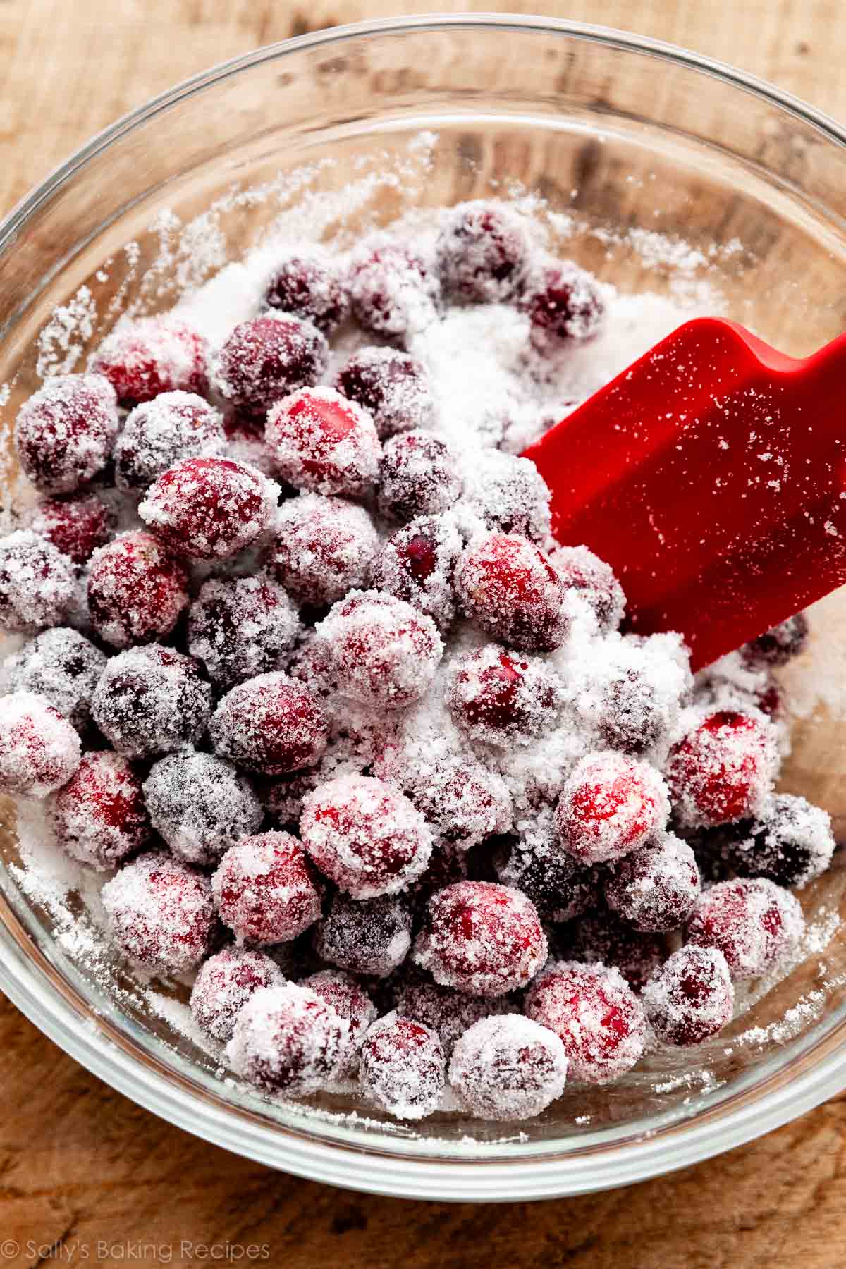 sugar and berries in glass bowl.