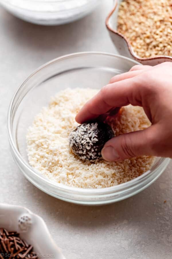 rolling dessert ball in coconut.