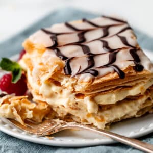 mille feuille with pastry cream filling and chevron-style icing and chocolate on top.