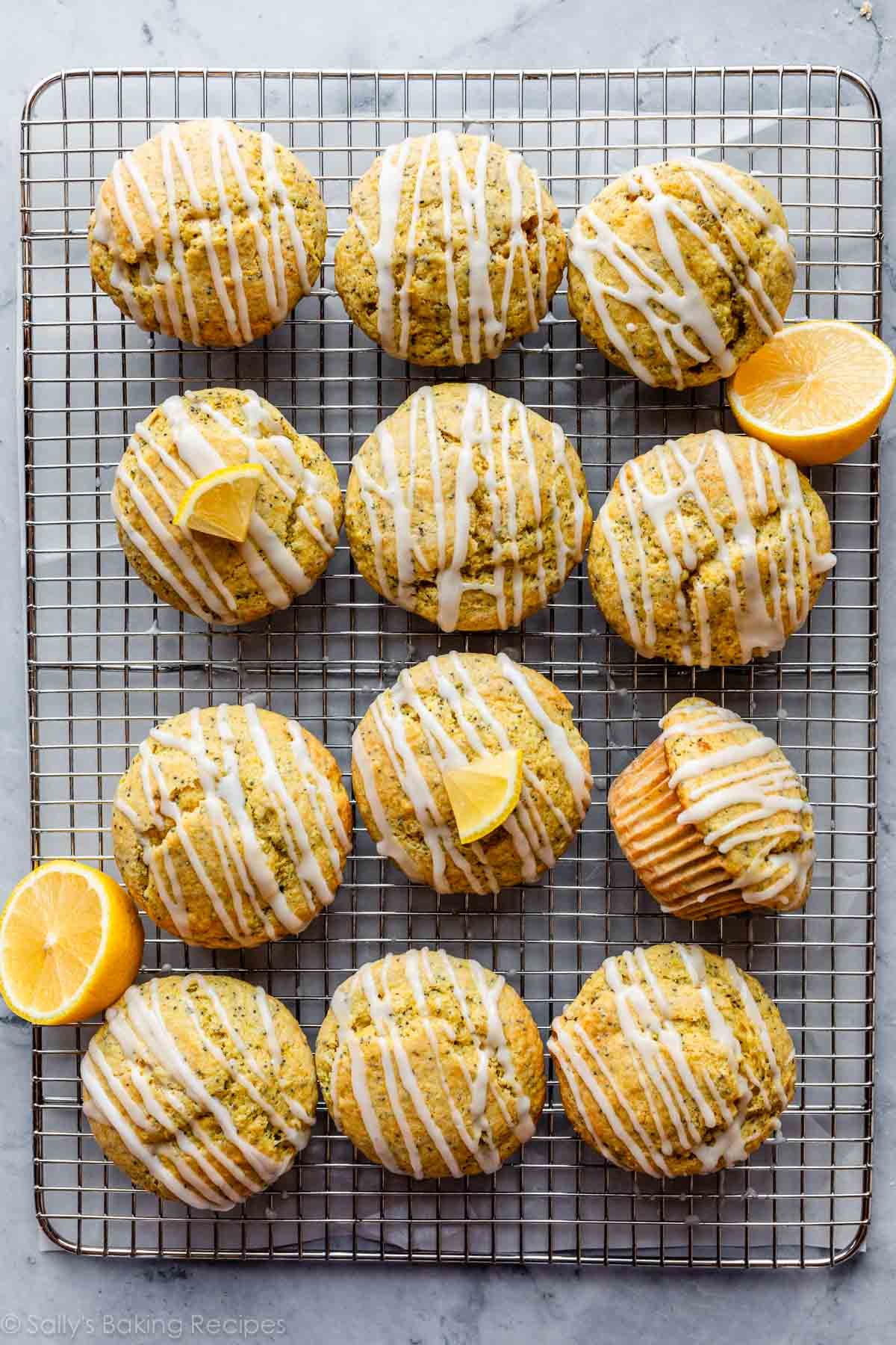 12 lemon poppy seed muffins on cooling rack.