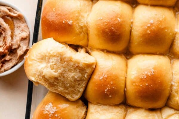 sweet potato rolls in glass baking pan.
