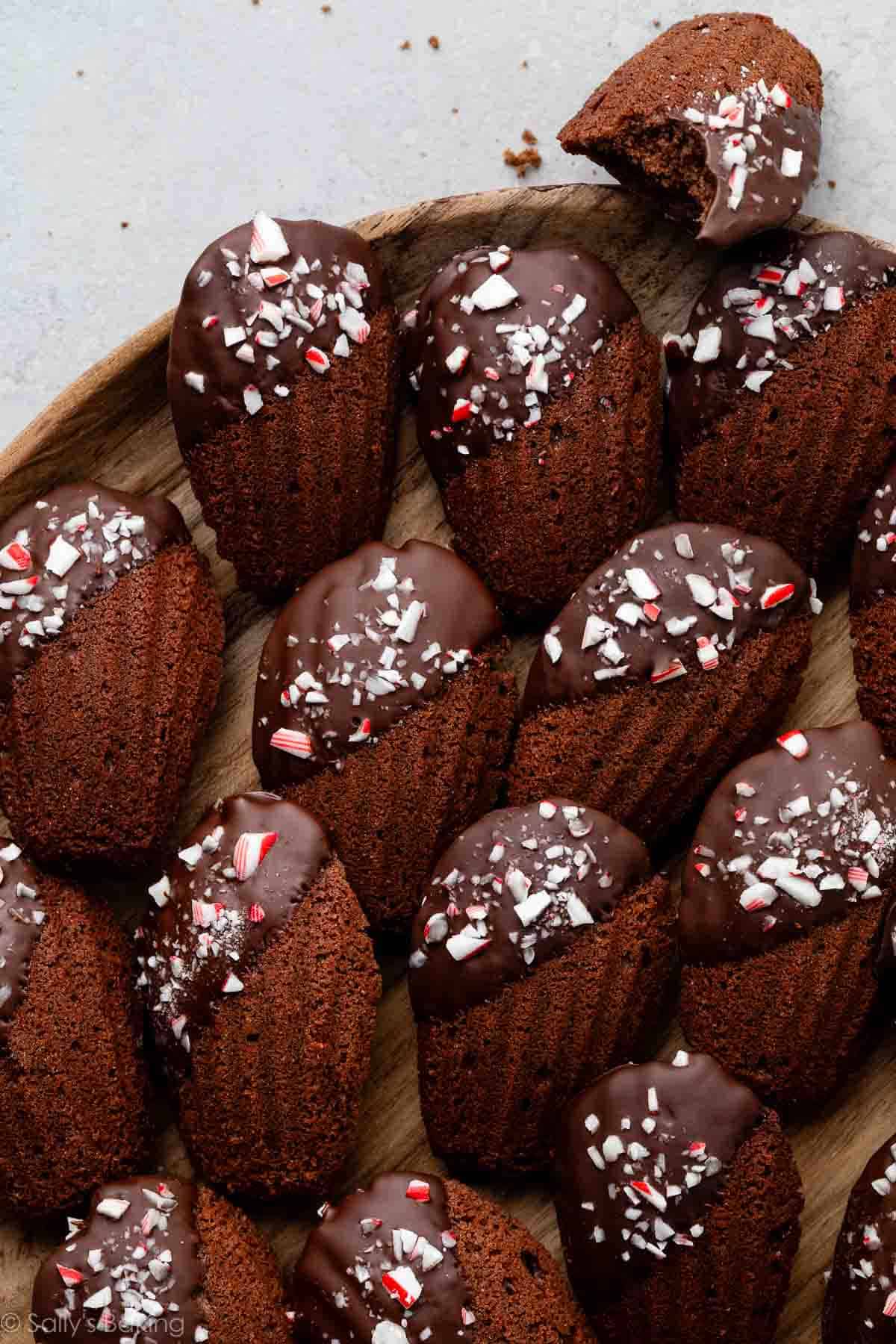 chocolate peppermint madeleines on wooden plate.