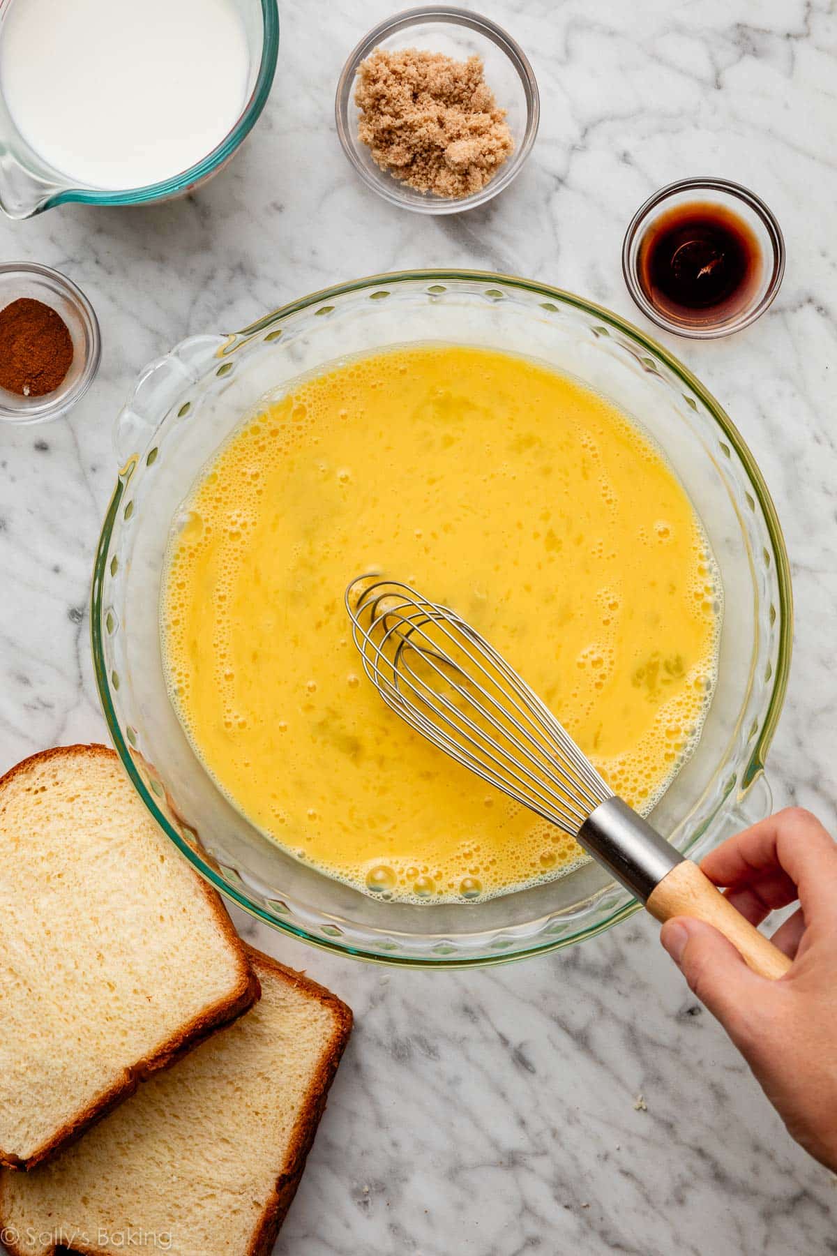 whisking eggs in pie dish.