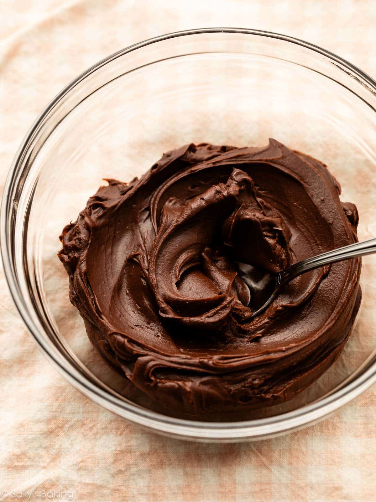 thickened chocolate ganache in glass bowl.