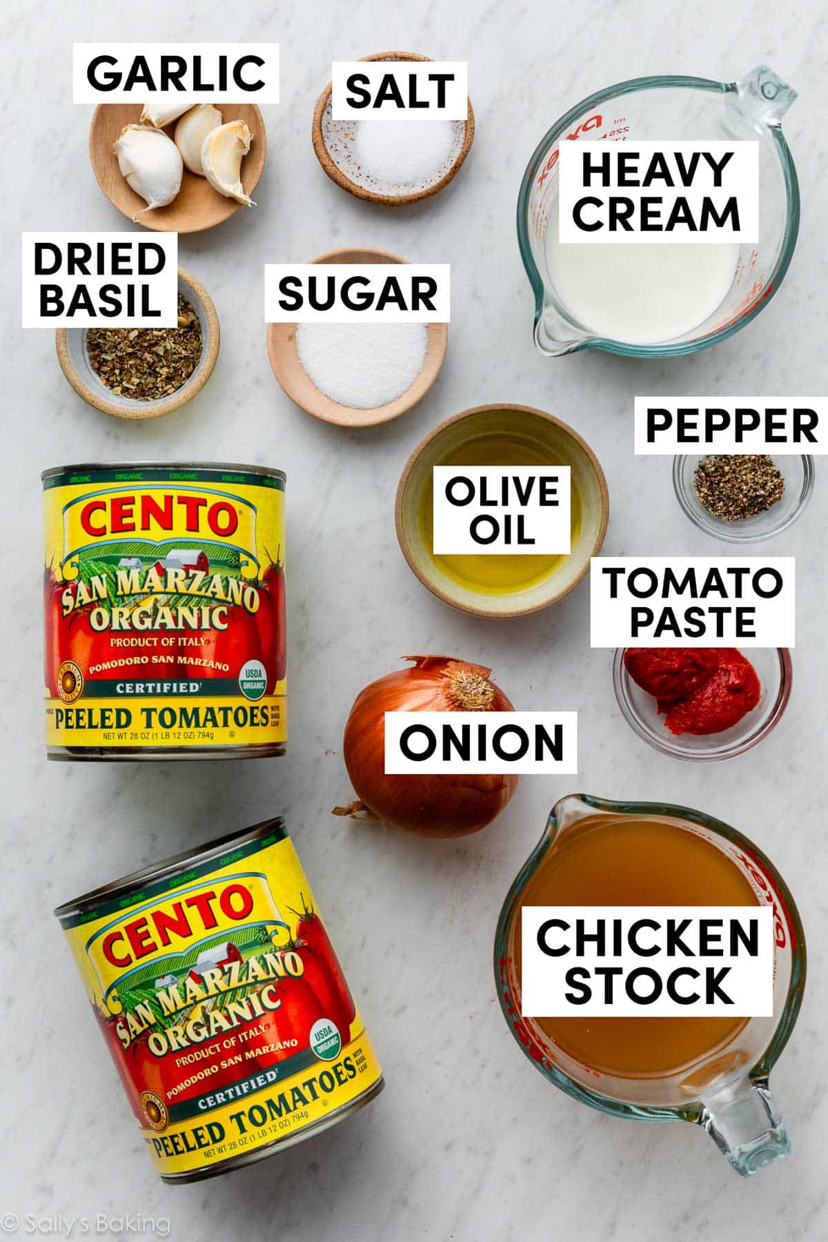 ingredients measured in bowls including cream, olive oil, pepper, sugar, salt, basil, and garlic.