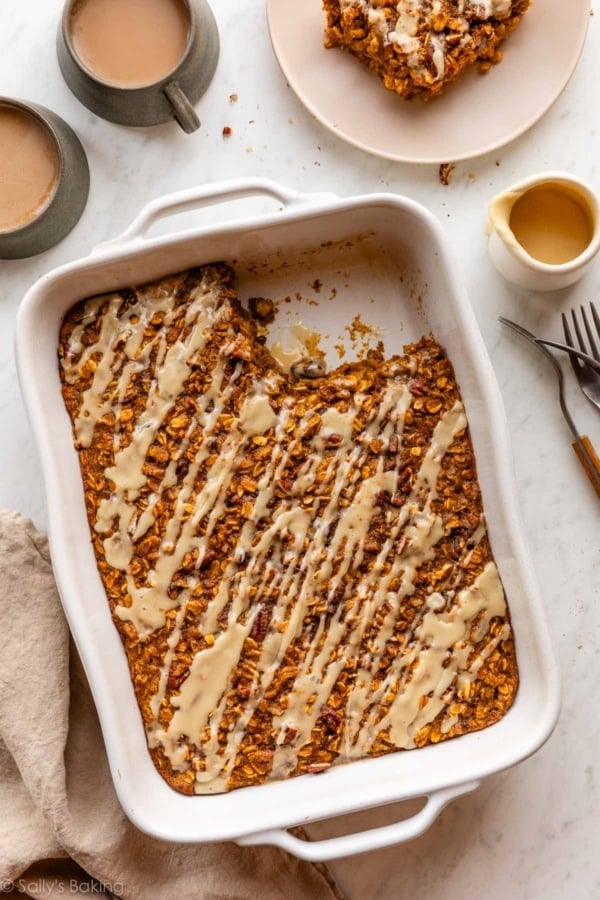 pumpkin baked oatmeal in a white ceramic baking dish.