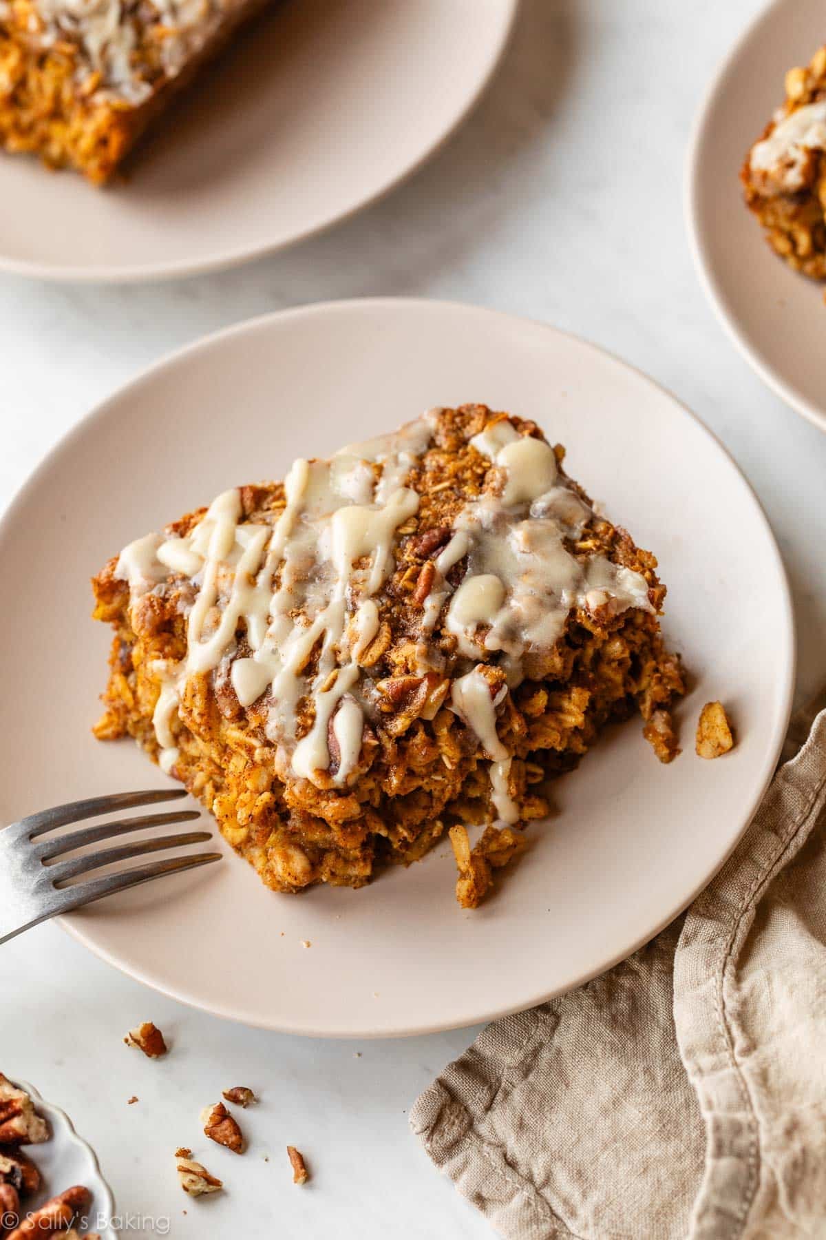 pumpkin baked oatmeal slice on a plate with a fork.
