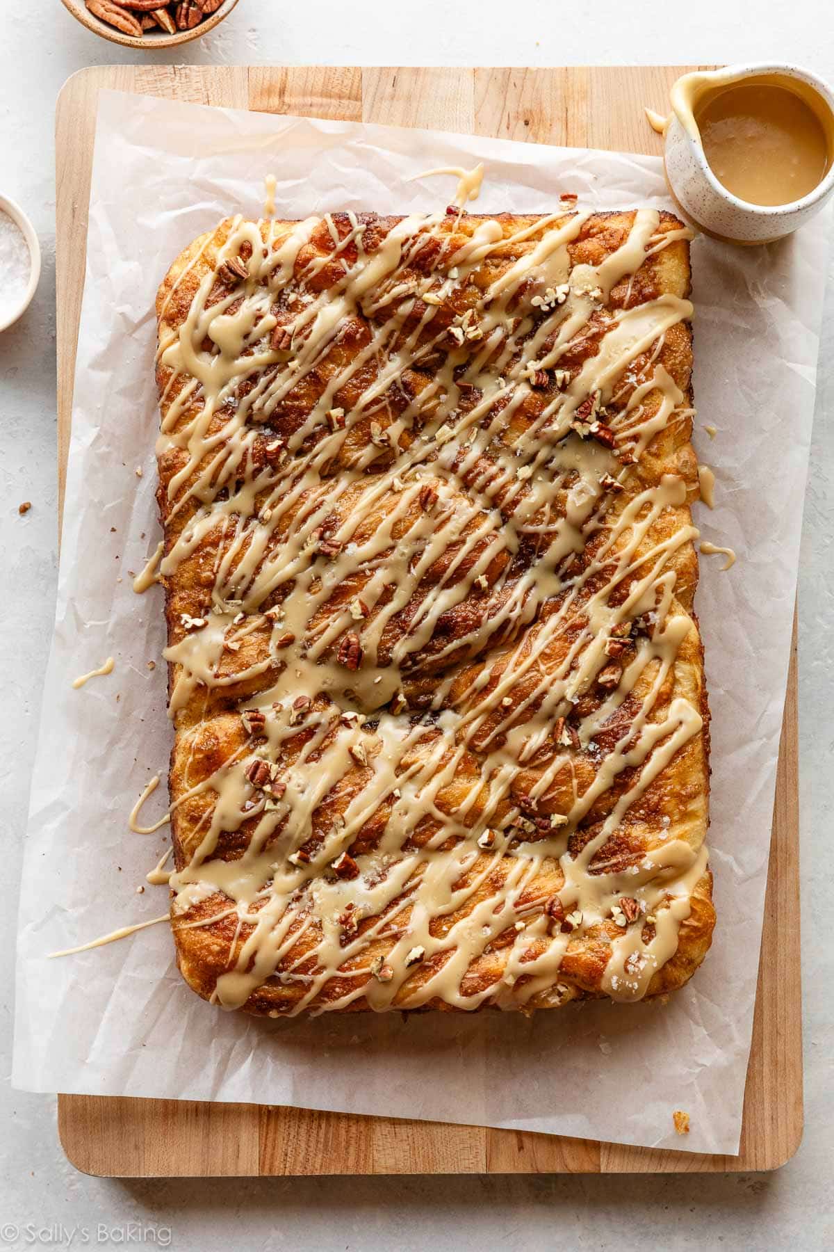 salted maple pecan focaccia topped with maple icing.