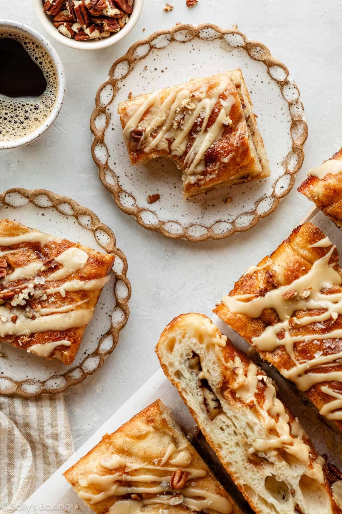 salted maple pecan focaccia slices with coffee.