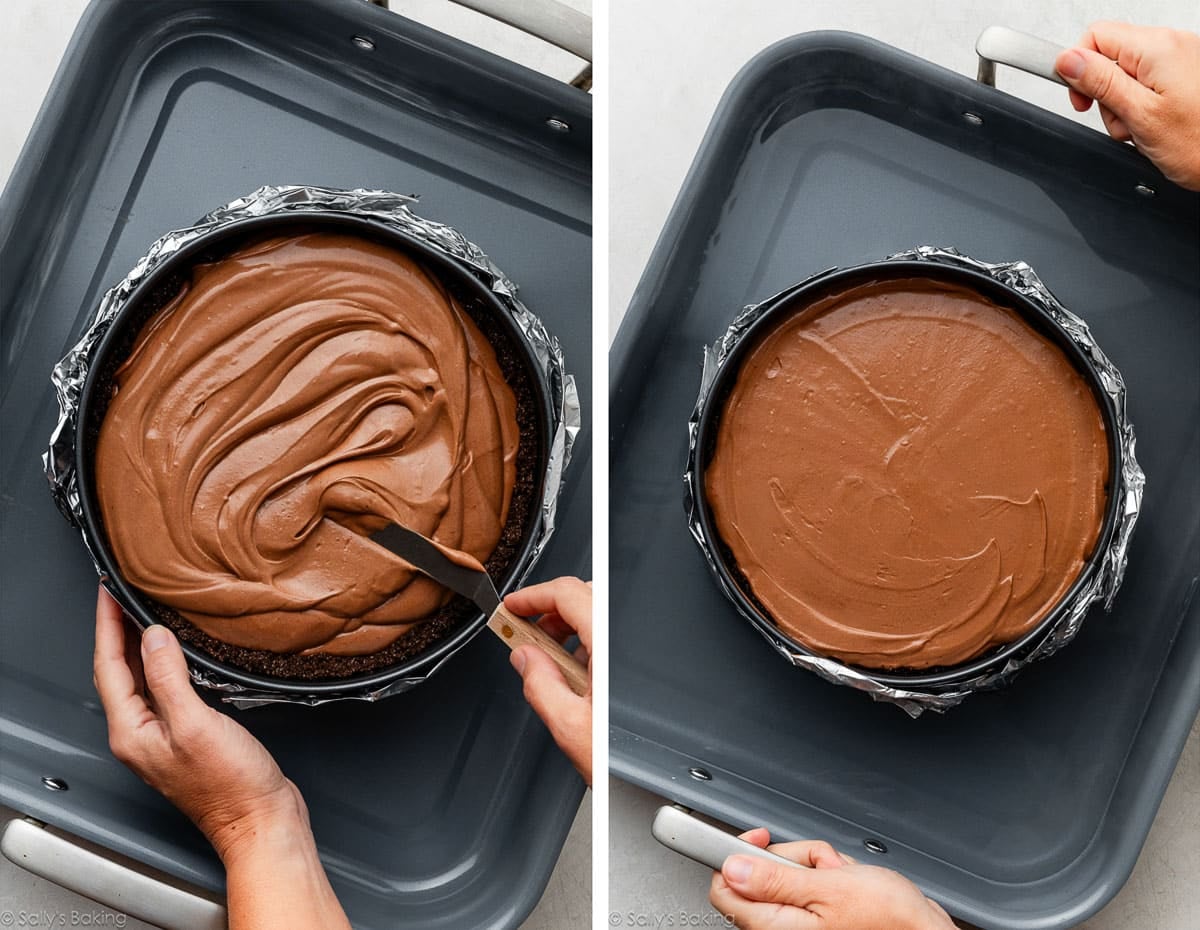 spreading cheesecake batter into a springform pan set inside a roasting pan.
